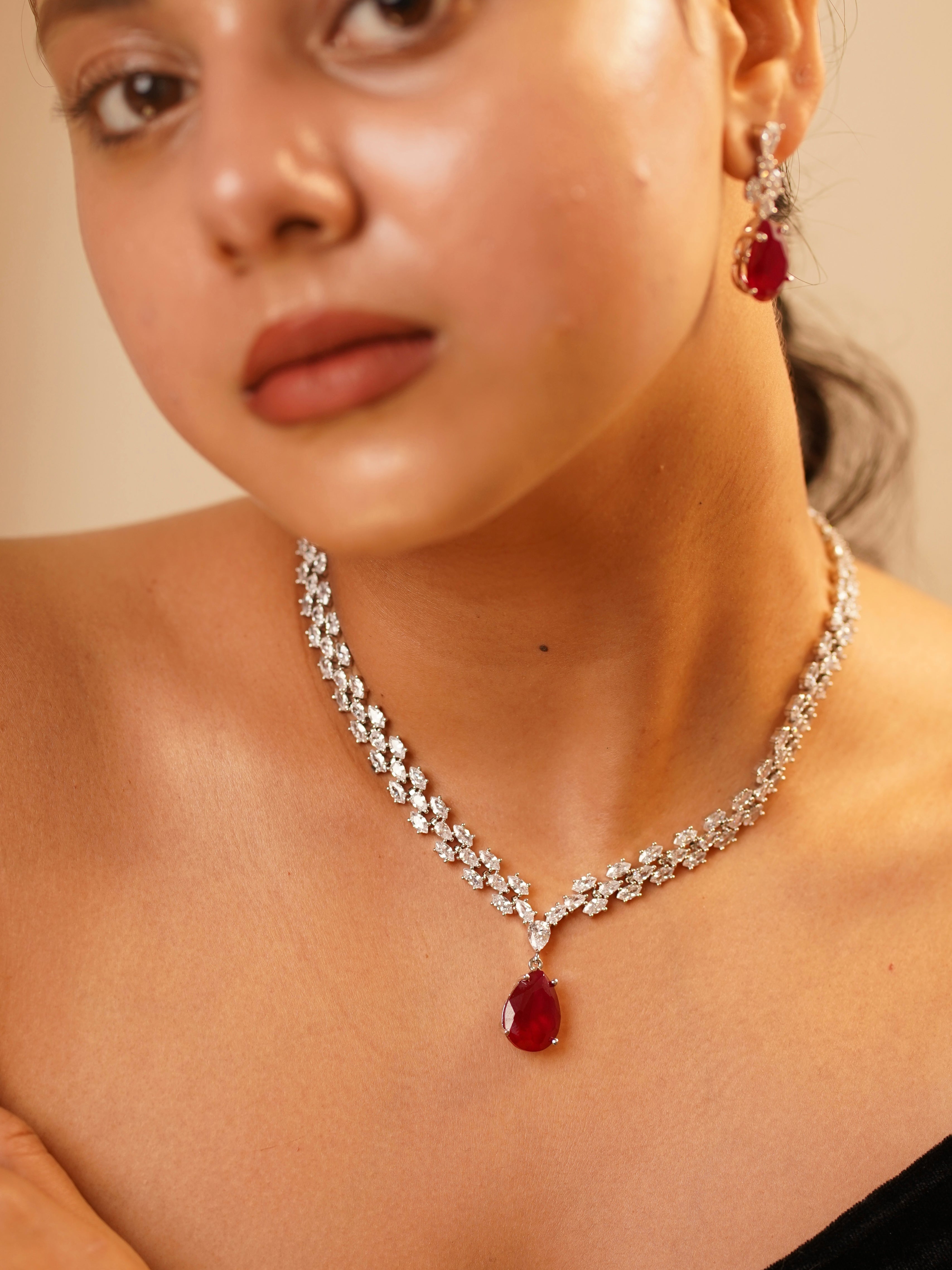 Ruby diamond necklace set with silver plating and rich stone embellishments